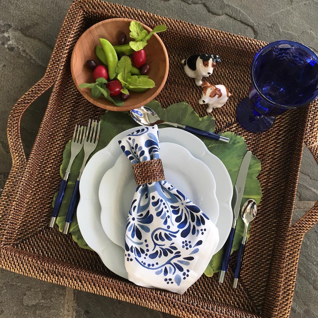 Curated picnic basket with place settings.