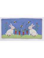 Blue Pillow with 2 White Rabbits Holding Carrots